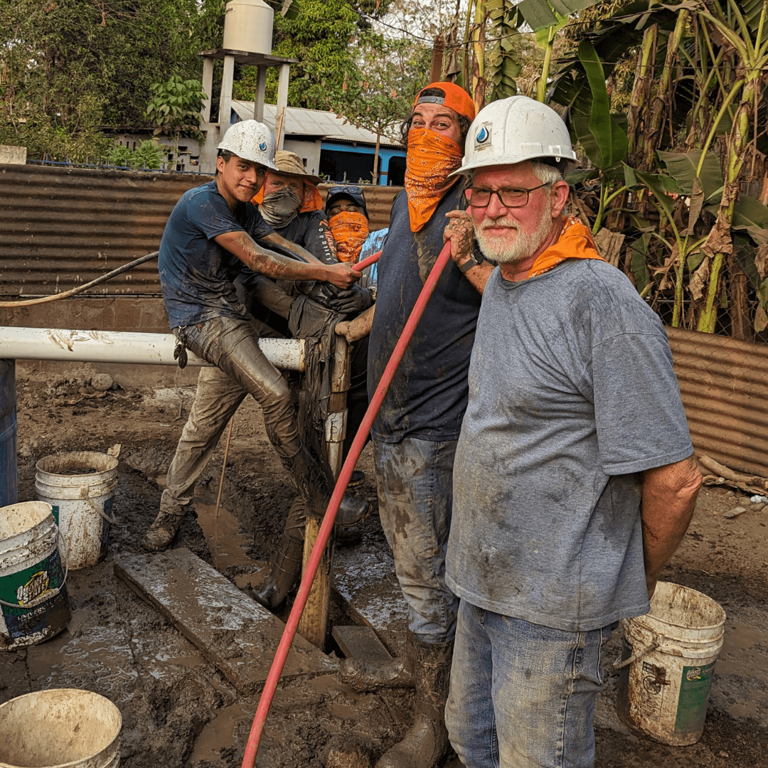 Mark and Wayne helping with the drilling