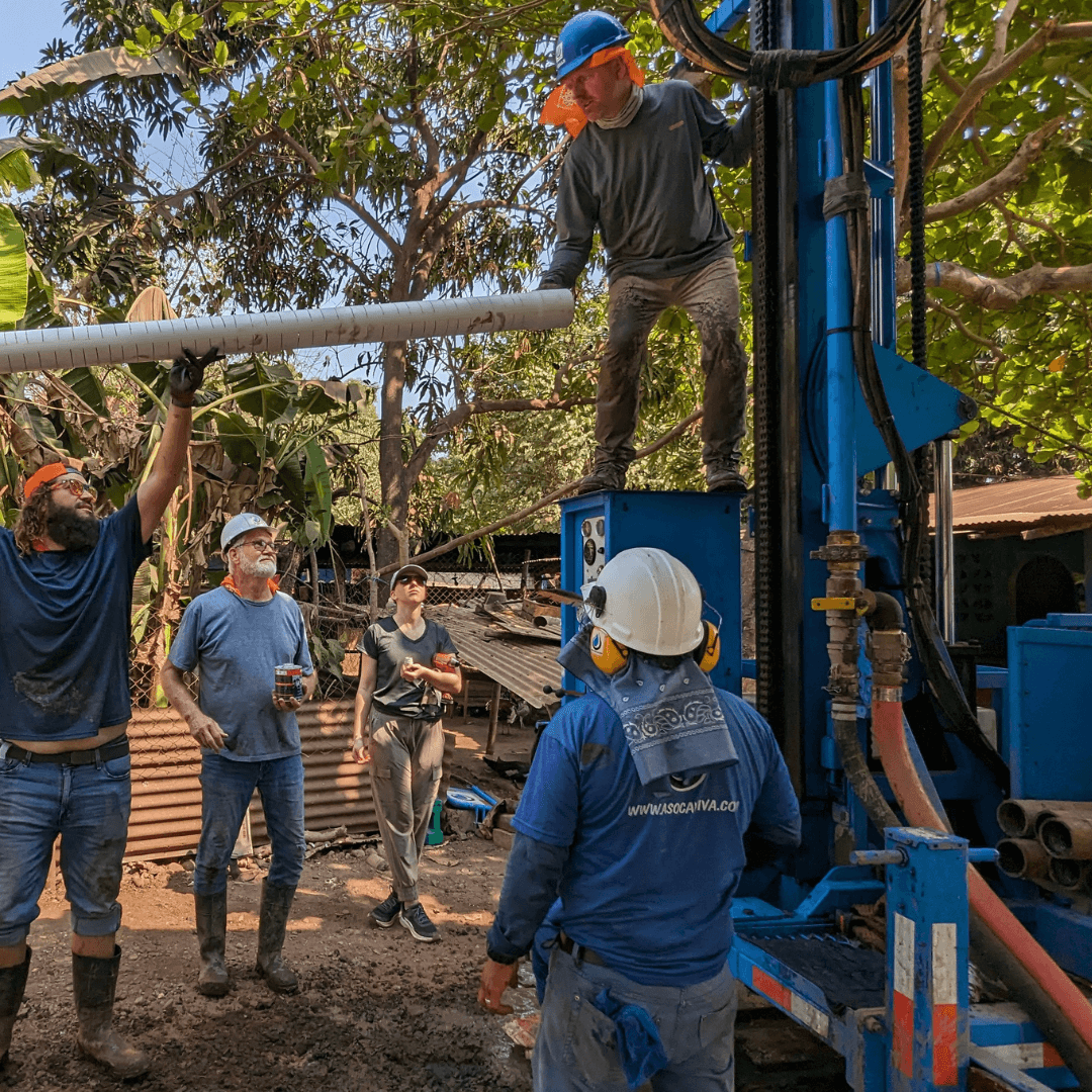 Mark and Keith moving pipes